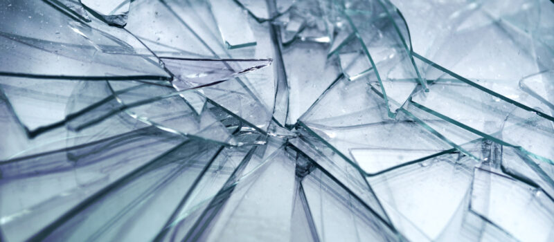 heap of shattered transparent glass with sharp edges